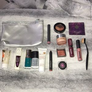A makeup bag full of makeup and beauty items